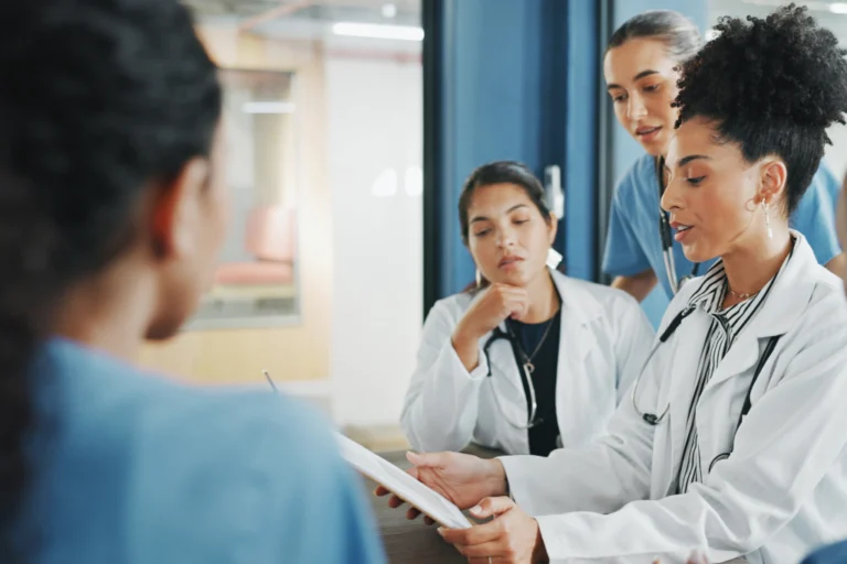 Healthcare professionals discussing a patient’s care plan.